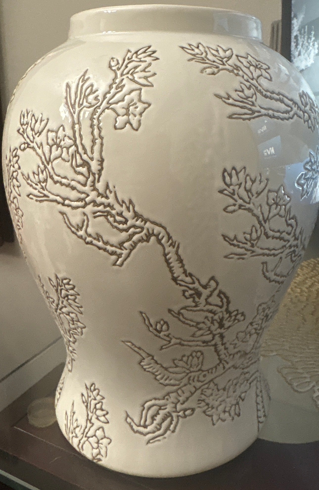 Decorative vase features.
